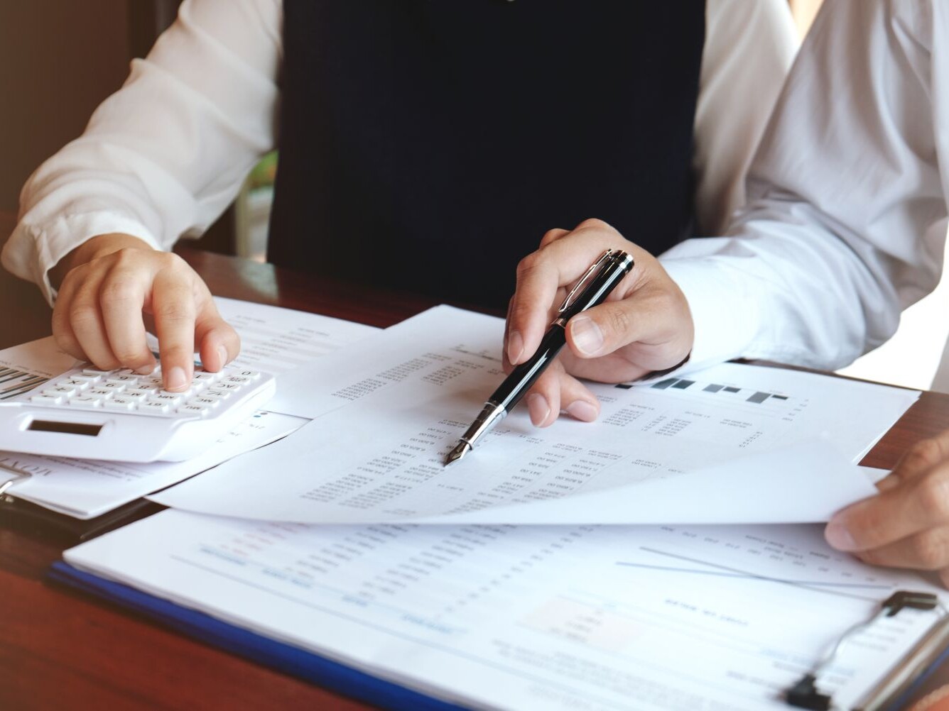Tax professional reviewing financial documents