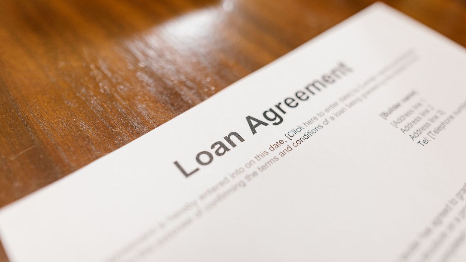 Loan agreement document on a desk